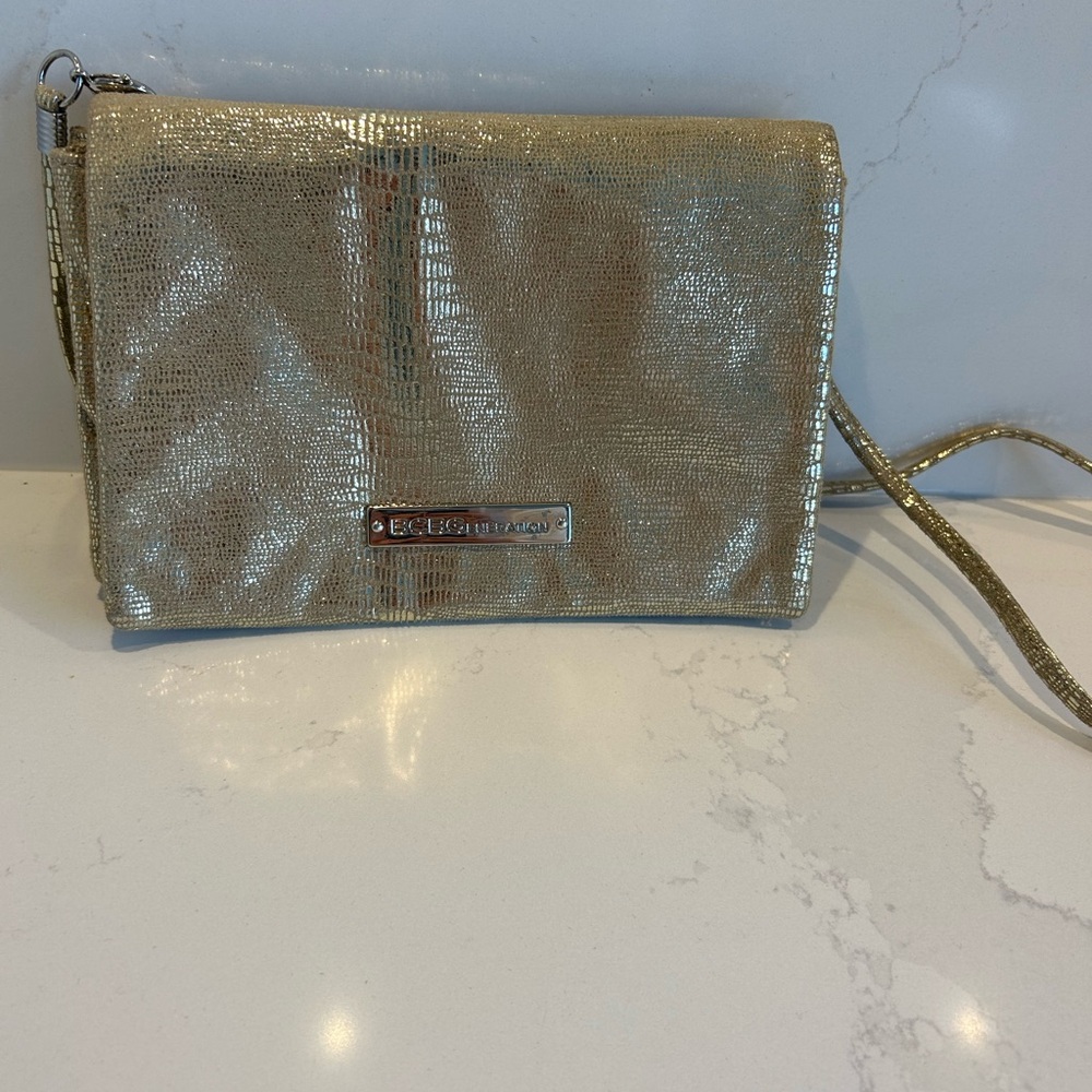 BCNG generation gold crossbody clutch with removable strap